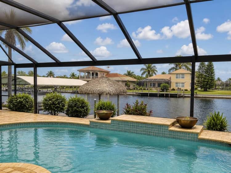Screened lanai and pool on a Florida waterfront