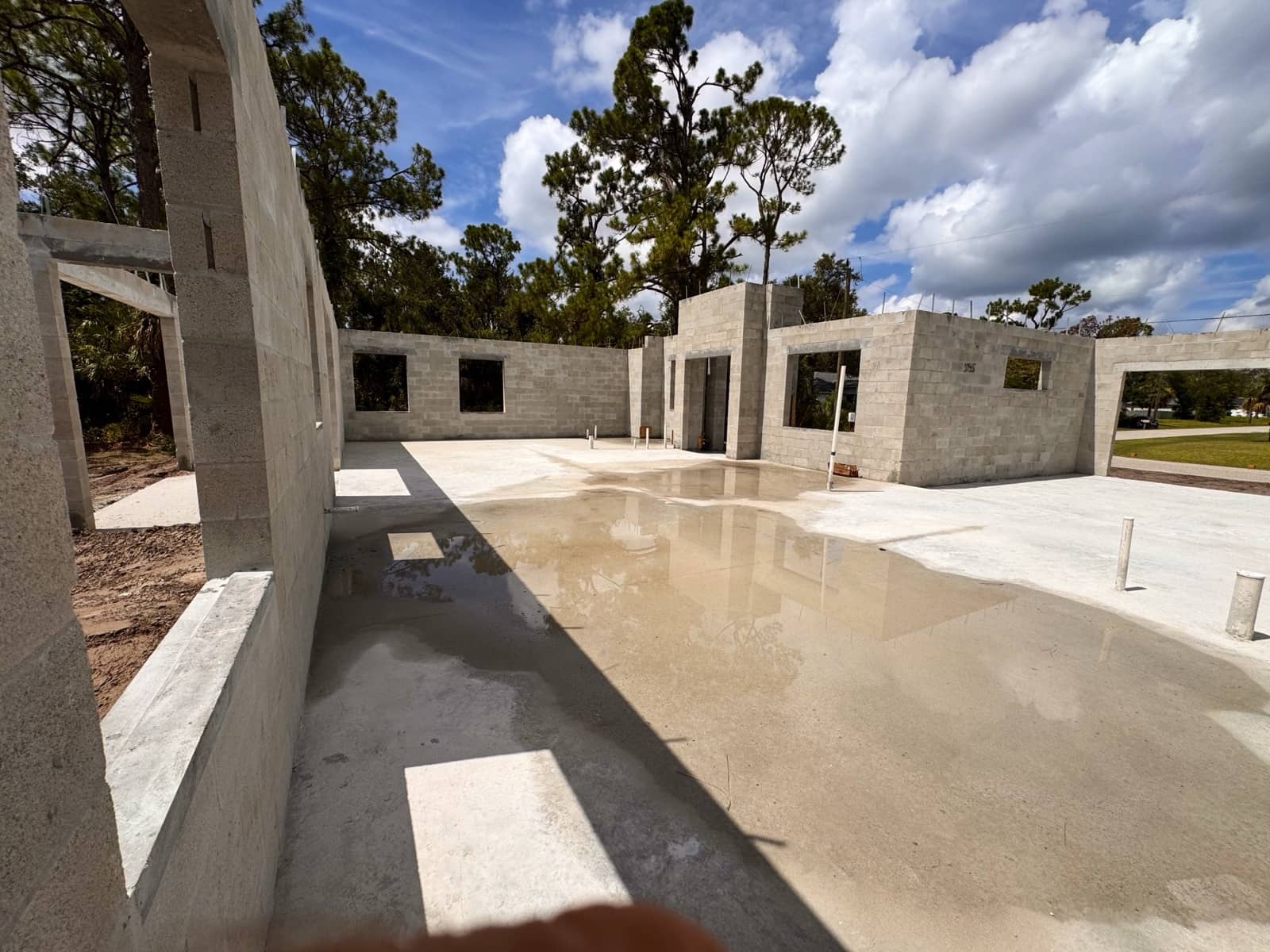 Block shell interior after rain | concrete and foundation work in Port Charlotte, FL by Sosnin Builders