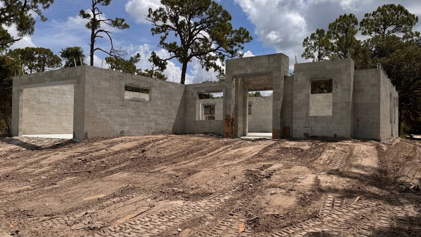 Full block shell exterior front elevation | concrete and foundation work in Port Charlotte, FL by Sosnin Builders