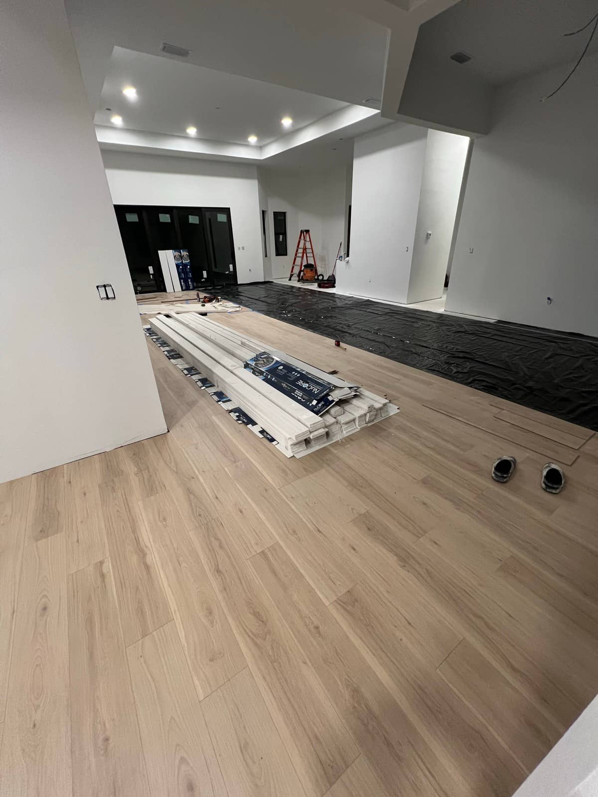 New LVP flooring install in progress | construction work in progress in Port Charlotte, FL by Sosnin Builders