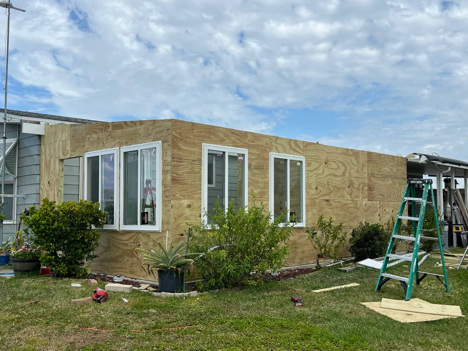 Mobile home addition sheathed new windows | framing work in North Port, FL by Sosnin Builders