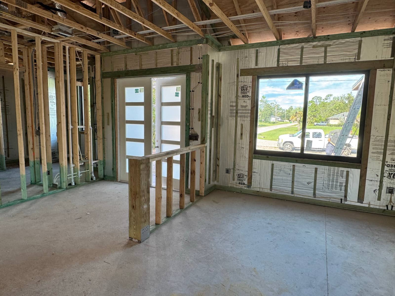 Framed interior with french doors | framing work in Port Charlotte, FL by Sosnin Builders