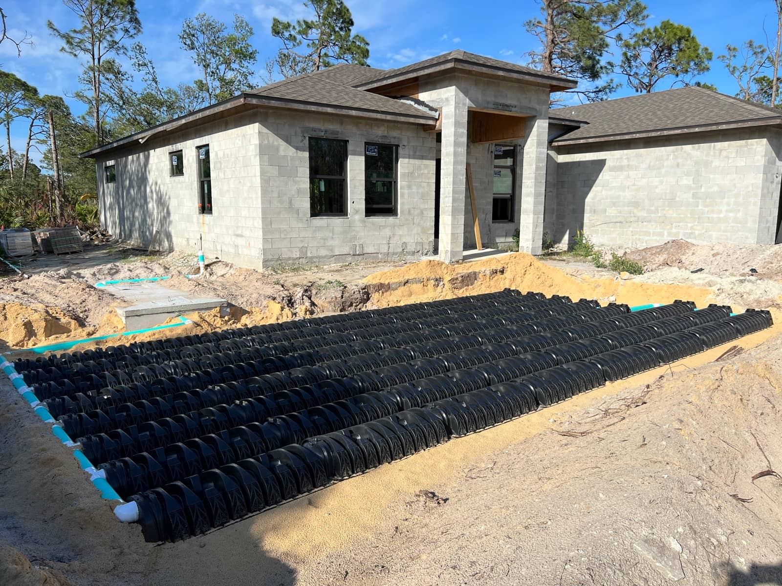 Septic drain field chambers before backfill | new home construction in Port Charlotte, FL by Sosnin Builders