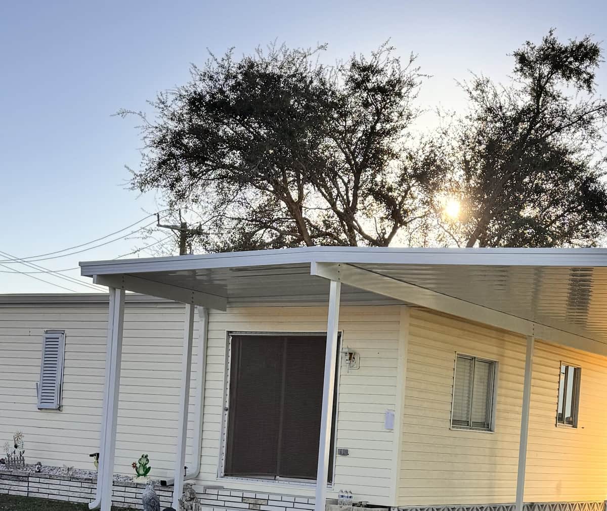 Finished aluminum carport built by Sosnin Builders in Southwest Florida