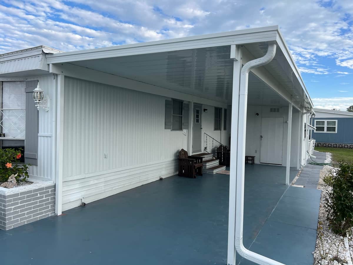 Aluminum carport and covered entry built to Florida wind code